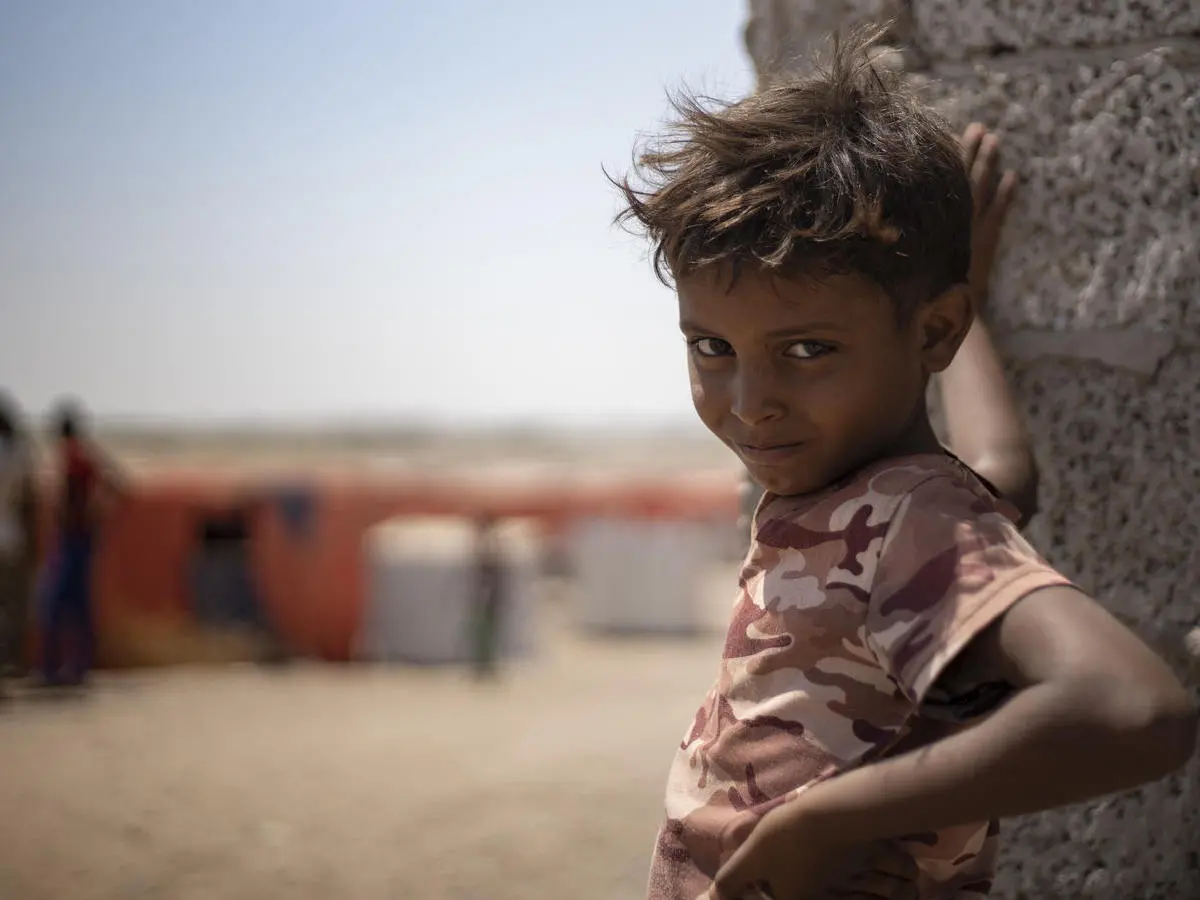 A child from Yemen's Al-Meshquafah camp for internally displaced people, 2019.