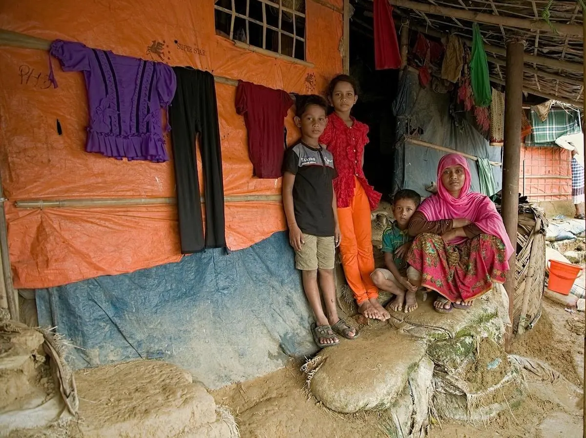 On 11 July 2019 in Bangladesh, (left-right) Mohammad Jonayed, Jannatul Noor, Mohammad Shoyef and Ramjana Begum outside their shelter in Jamtoli camp in Cox's Bazar. 
