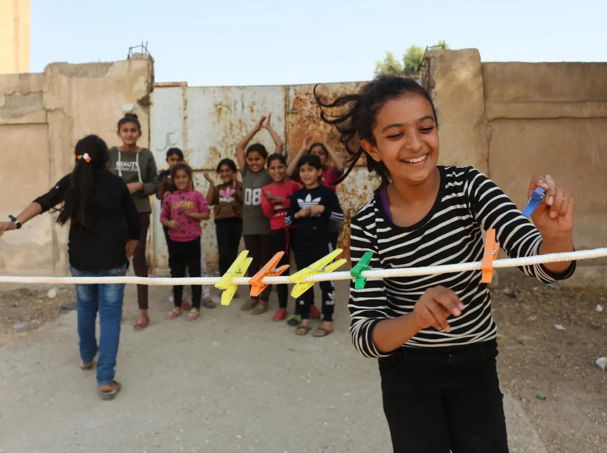 On October 28, 2019 at a shelter in Hasakeh City, Syria, Amani, 12, takes part in game organized by UNICEF staff to help displaced children heal from trauma. On October 28, 2019 at a shelter in Hasakeh City, Syria, Amani, 12, takes part in game organized by UNICEF staff to help displaced children heal from trauma.