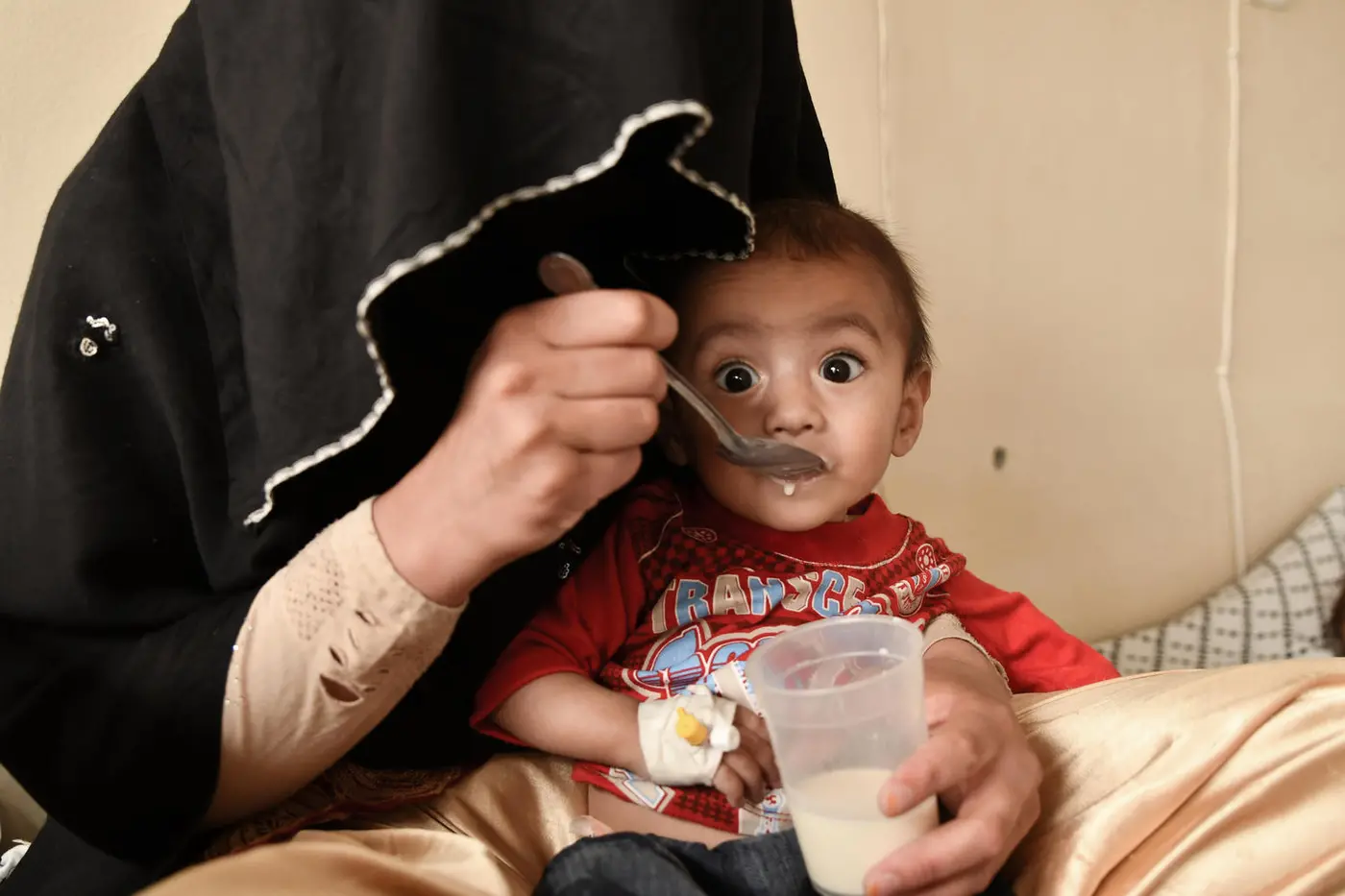 A mother gives milk to her baby in the Kisham hospital of the Kishim district, Badakhshan province in the Northeast of Afghanistan.