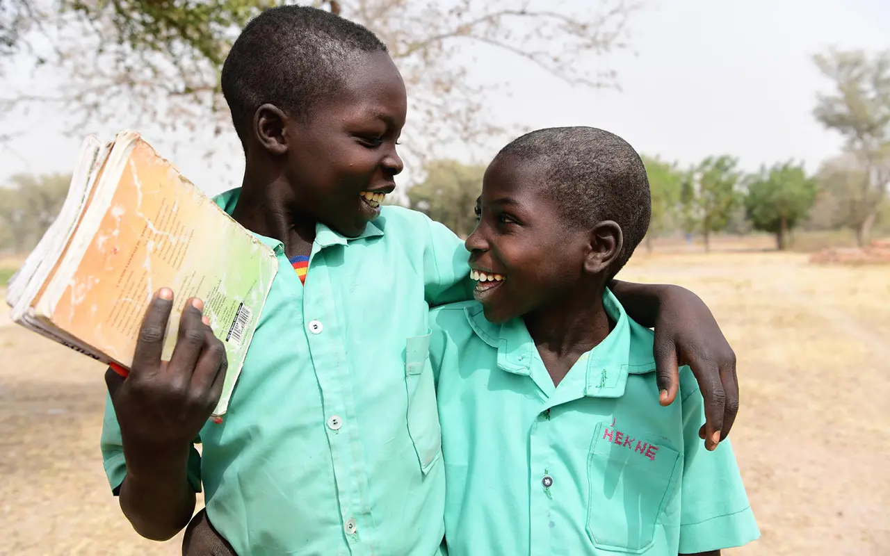 Children Hugging with Books