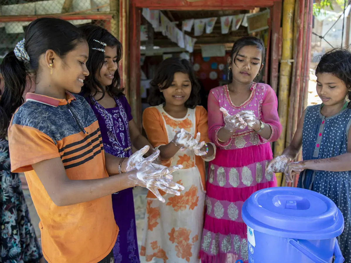 On 9 March 2020, children wash their hands with soap at a UNICEF-supported learning centre in the Kutupalong camp, a Rohingya refugee camp, in Cox’s Bazar, Bangladesh.