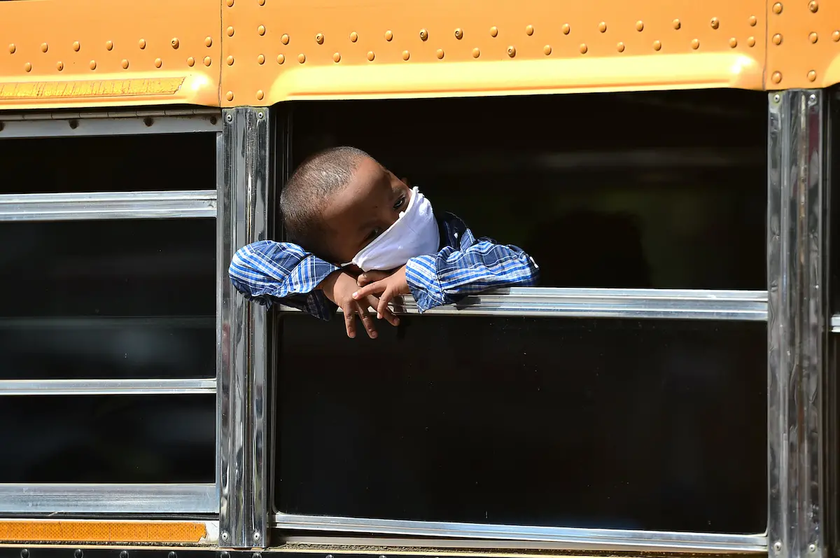 A boy from the Miskito ethnic group in Honduras leaves Tegucigalpa for his home community of La Mosquitia after his parents lose their jobs due to the COVID-19 pandemic.