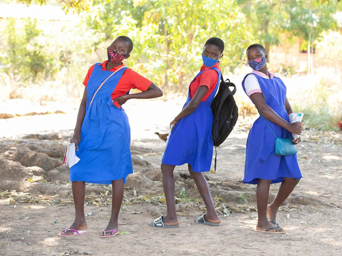 Students take a break outside the UNICEF-supported Luwambaza primary school in Nkhatabay district, northern Malawi in 2020.
