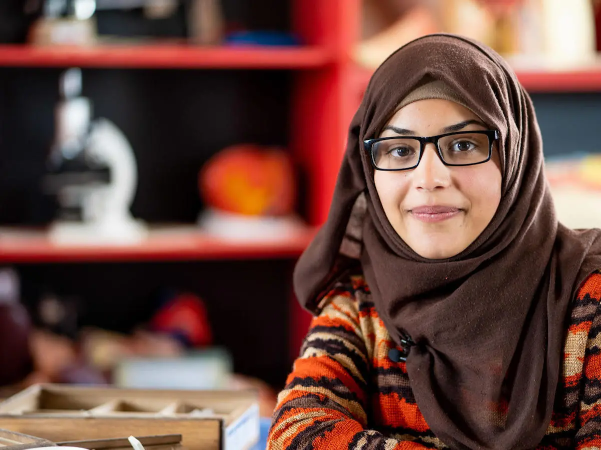 Bodoor, 17, in the science lab of her UNICEF-supported school in Jordan in 2018. She and her family fled violence in Syria and settled in Azraq Refugee Camp since 2014. Bodoor, 17, in the science lab of her UNICEF-supported school in Jordan in 2018. She and her family fled violence in Syria and settled in Azraq Refugee Camp since 2014.