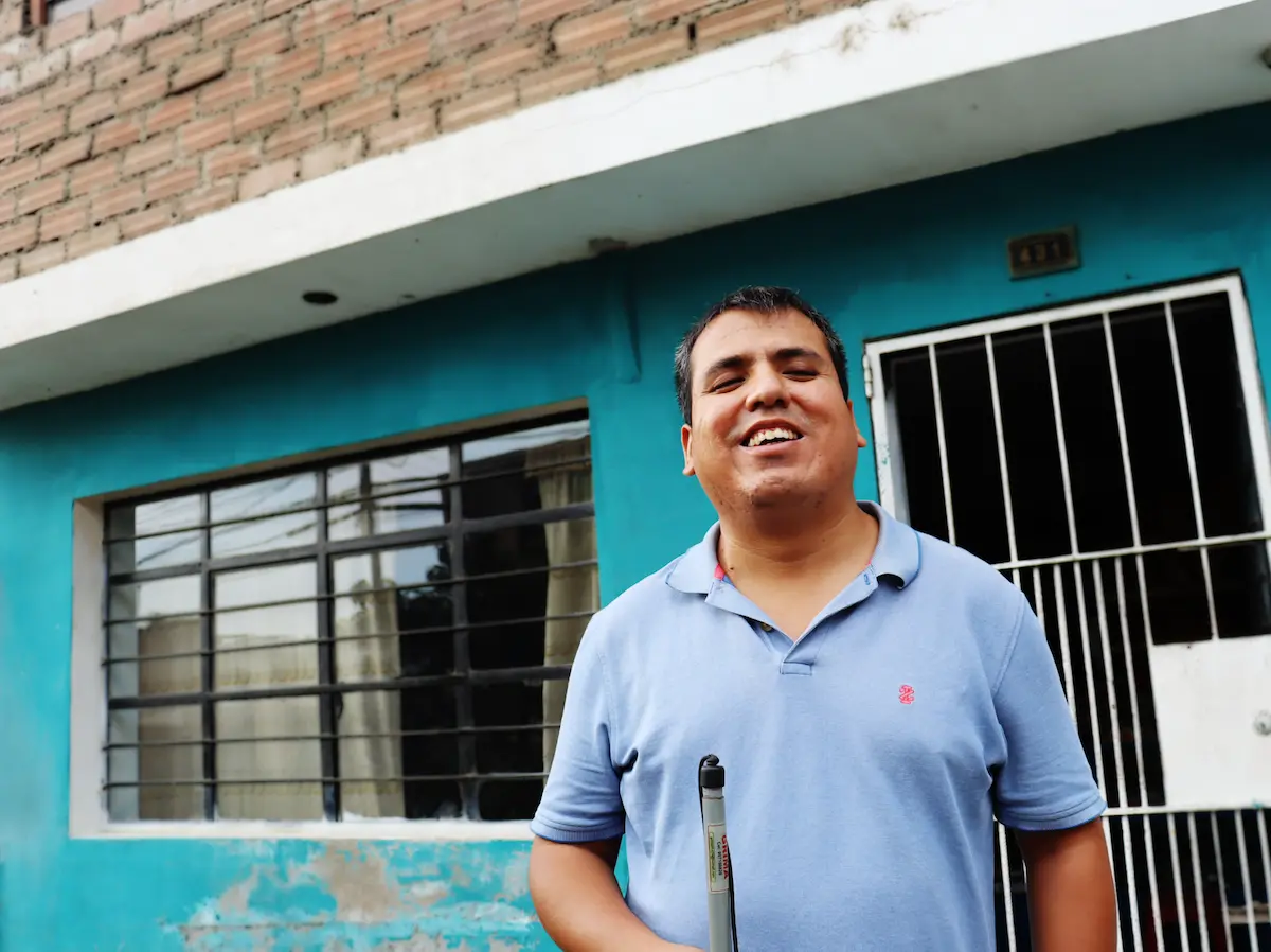 In Lima, Peru, teacher Carlos Espinoza, who lost his sight at an early age, works with refugee children in a program run by UNICEF and funded by Education Cannot Wait (ECW).