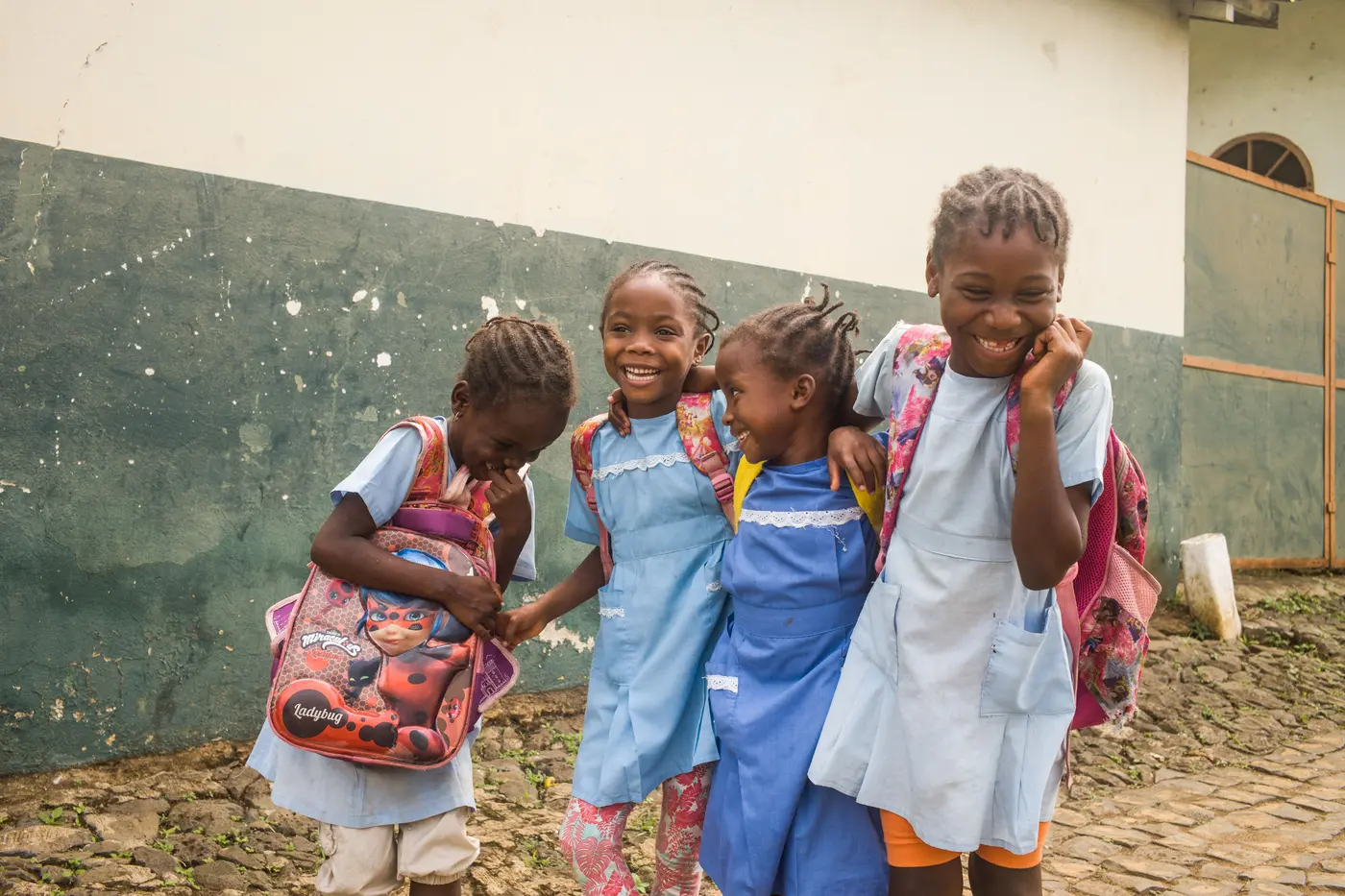 School Children Hugging and Laughing