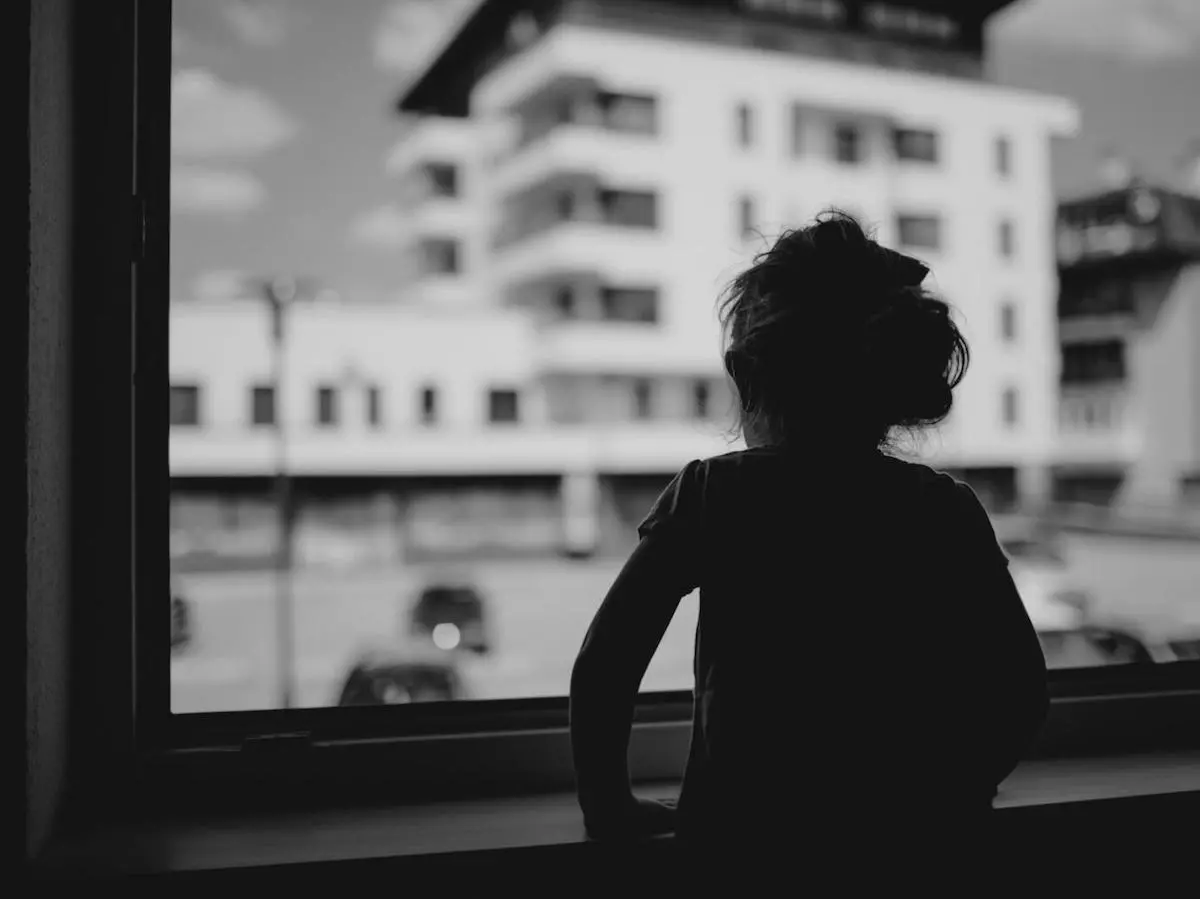 Three-year-old Lana looks out the window of her family's home in Bosnia and Herzegovina. Three-year-old Lana looks out the window of her family's home in Bosnia and Herzegovina.
