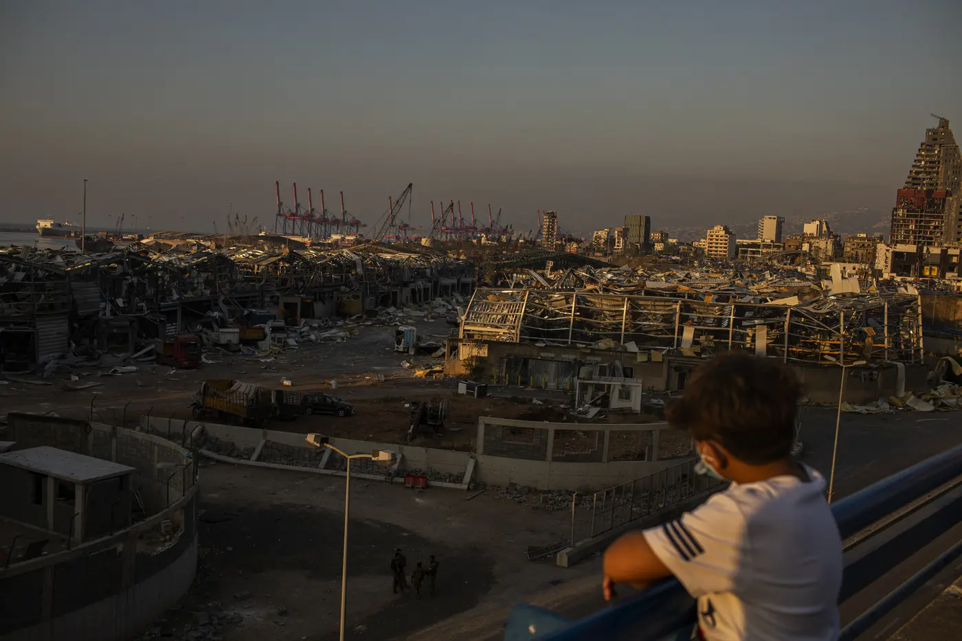 Boy Overlooking City