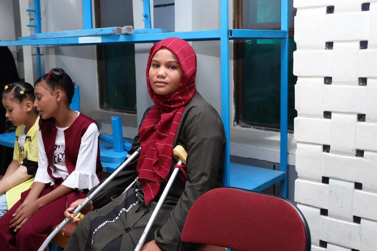 Ramyah, who was injured by war shrapnel, awaits treatment at a UNICEF-supported prosthetics center in Aden, Yemen on Oct. 14, 2021. Ramyah, who was injured by war shrapnel, awaits treatment at a UNICEF-supported prosthetics center in Aden, Yemen on Oct. 14, 2021.