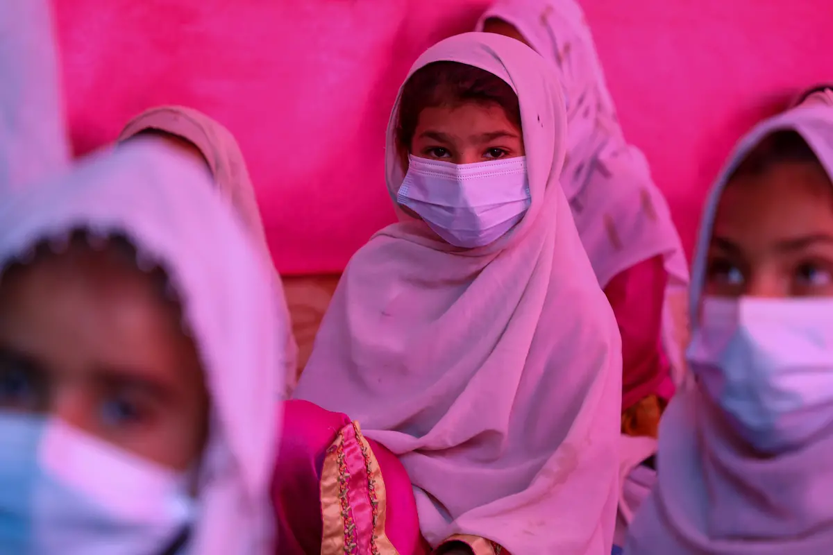 Girls attend classes at a UNICEF-supported community-based school in Kandahar’s Dand district.