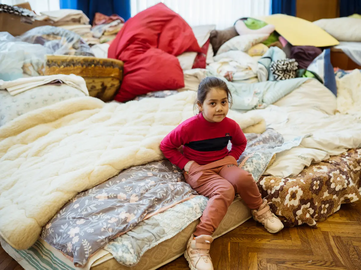 On February 28, 2022, 7-year-old Elvira rests in an air-raid shelter in Lviv, western Ukraine. 