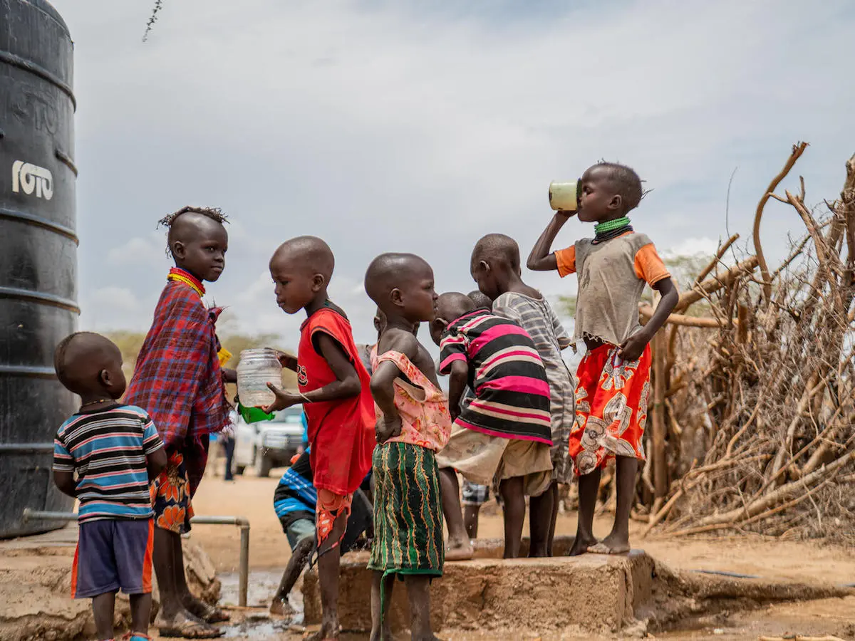 Children at Sopel Primary School in Turkana County, Kenya, get safe water from a solar water system rehabilitated by UNICEF. 