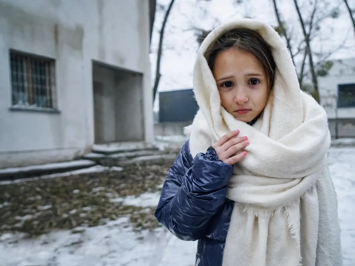 Eight-year-old Eva shares a small room with her mother and sister in a modular complex for people who have lost their homes in Irpin, Ukraine.
