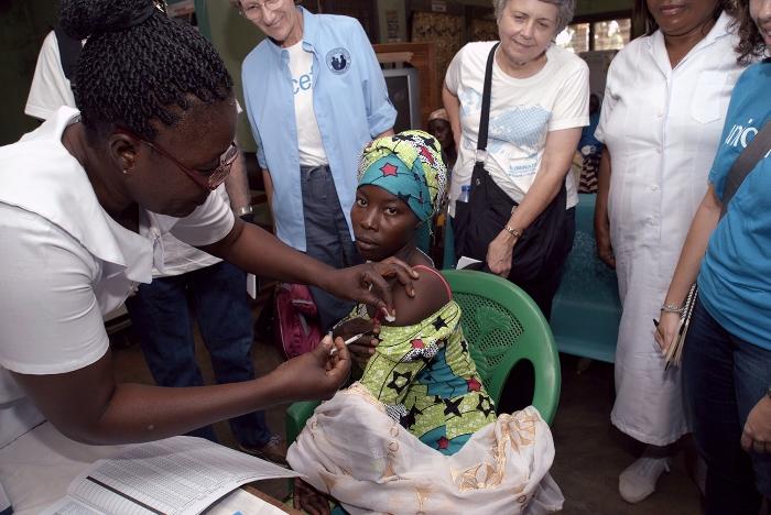Margaret Pesewu gives expecting mother Hamdia (age 22) her TD vaccine at Savelugu Municipal Hospital