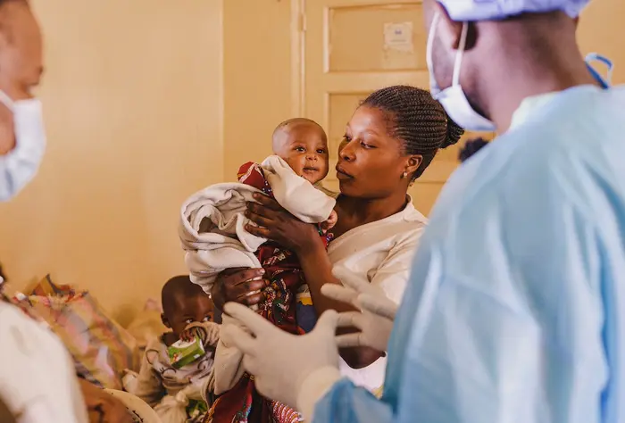 UNICEF DRC&rsquo;s Deputy Representative, Dr. Mariame Sylla, speaks with a patient during her visit to the mpox isolation and treatment unit at Lwiro Hospital, in the Miti-Murhesa health zone, South Kivu province, Democratic Republic of the Congo, Sept. 4, 2024.