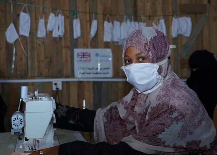 With support from UNICEF, members of a mothers' club at the Al-Shab IDP center in Aden, Yemen are sewing masks to protect their families and their community from the spread of the novel coronavirus.