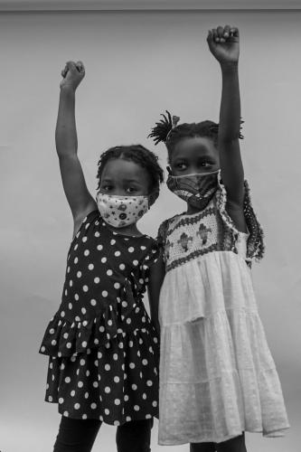 Friends Kennedy (left) and Amina reunited at the Children's March outside the Brooklyn Public Library in June, 2020. 