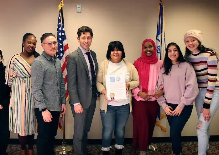 Minneapolis Mayor Jacob Frey (in jacket and tie) and members of the Minneapolis Youth Congress celebrate the launch of CFCI.. Minneapolis Mayor Jacob Frey (in jacket and tie) and members of the Minneapolis Youth Congress celebrate the launch of CFCI..