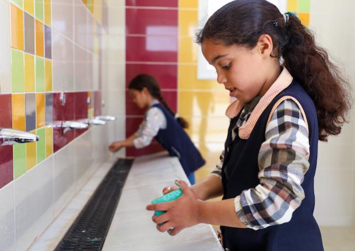 Students washing hands in the new UNICEF-sponsored sanitary block in the Talha elementary shool in Gabès, Tunisia.