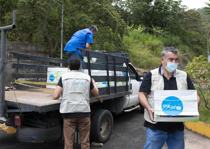 A UNICEF team delivers lights and reflectors for installation inside and outside a water treatment plant in Táchira, Venezuela on June 30, 2020.