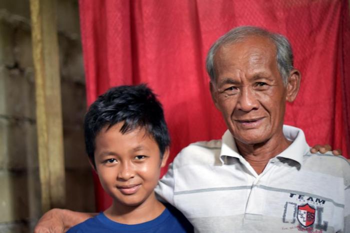 Rivaldi's mother is presumed to have died in the September 2018 tsunami. Now the 13-year-old does what he can to help his father, Pak Bakir, at home in Palu, Central Sulawesi. 