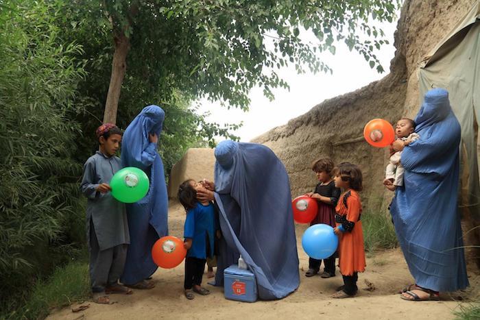 Roving vaccination teams protect children against polio in Nahri Siraj, Helmand, Afghanistan. 