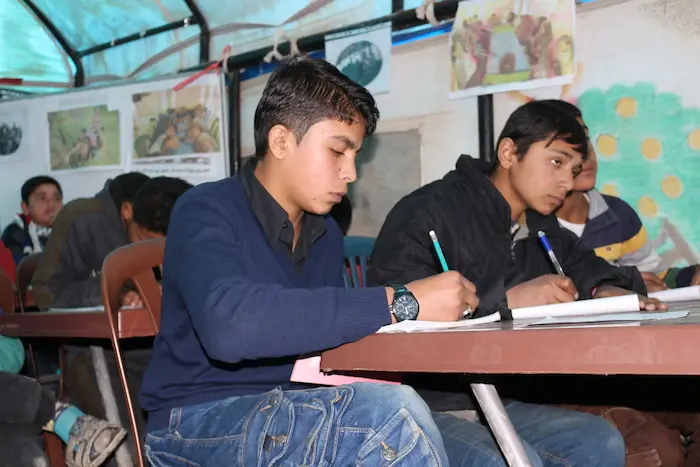 Syrian children displaced by violence continue their education at Areesheh camp in Hassakeh governate with help from UNICEF and Educate A Child. 