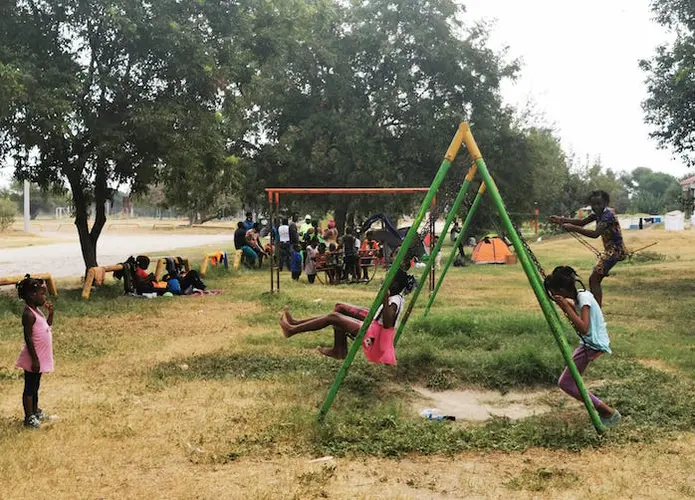 Children migrating with their families from Haiti play in Ciudad Acuña, Mexico in September 2021. 
