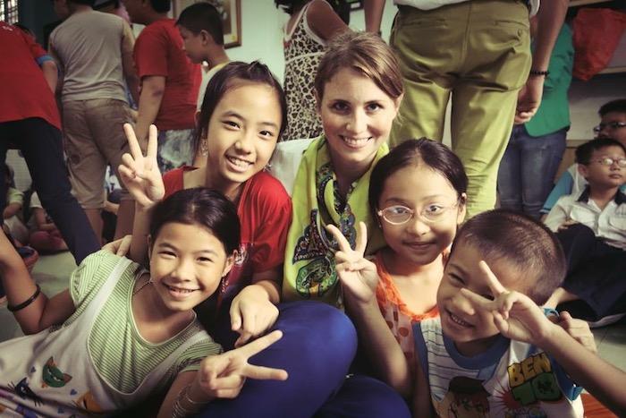 UNICEF Next Generation board member Emily Griset with schoolchildren in Ho Chi Minh City, Vietnam.