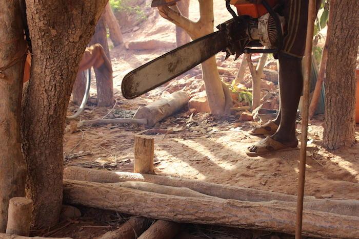 Daby, 14, operates a chainsaw at the Belema gold field in Mali, June 2017.