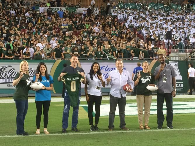 The U.S. Fund for UNICEF, the Florida Dream Center, and the NCAS are honored on the Football field during halftime. 