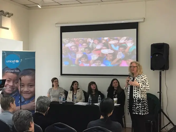 Beth Ellen Holimon, President of Dining for Women (far right), speaks at a parallel event during the 63rd annual Commission on the Status of Women in March 2019.