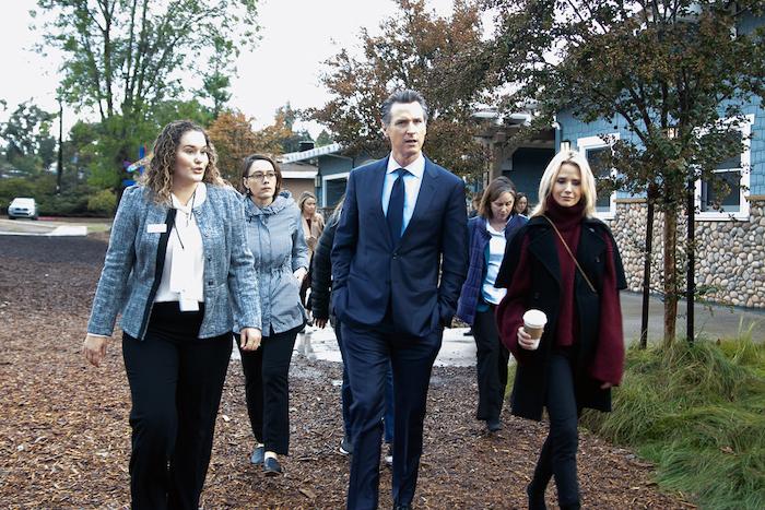 Kate Clark, Senior Director of Immigration Services at JFS leads a shelter tour for Governor-Elect Gavin Newsom and staff in November 2018.