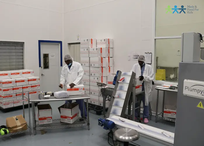 The Meds & Foods for Kids factory just outside Cap-Haïtien, Haiti produces 4 million kilograms of Ready-to-Use Therapeutic Food a year. The Meds & Foods for Kids factory just outside Cap-Haïtien, Haiti produces 4 million kilograms of Ready-to-Use Therapeutic Food a year.