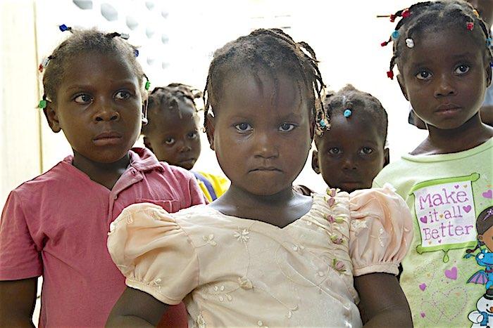 Girls at an orphanage school during UNICEF Haiti&#039;s education team post-storm assessment in the La Plaine area of Port au Prince, Haiti.
