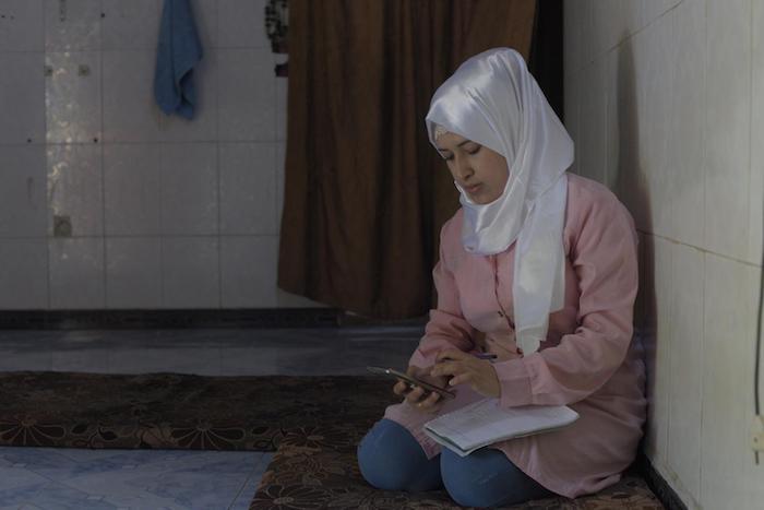 Safa enrolled in UNICEF-supported self-learning classes in Al-Bahariya village in rural Damascus at age 21, having recently returned there after six years on the move.