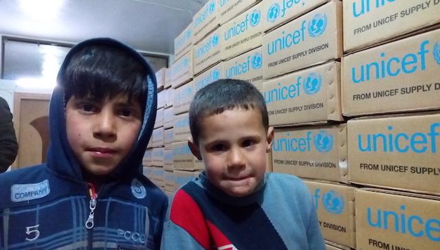 Ahsraf*, 11, and his friend Ali*, 9, in Madaya’s only health center. &quot;I play at home because school is closed,&quot; Ashraf says.
