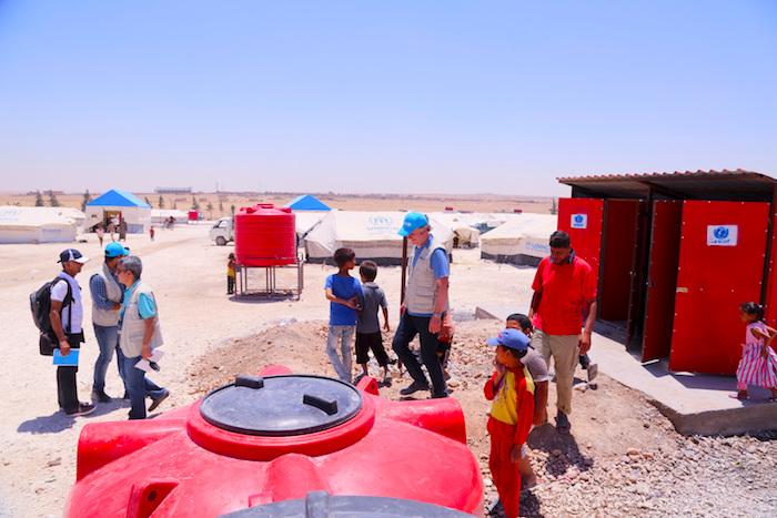 UNICEF installed water storage tanks, toilets and showers at Ain Issa refugee camp in northeastern Syria. 