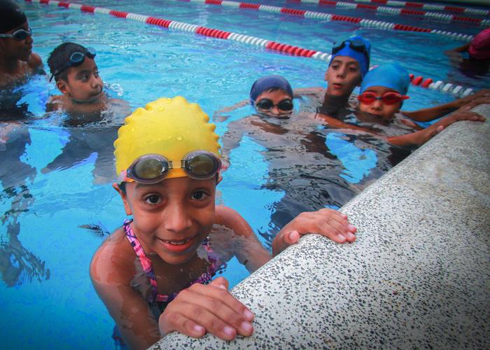 On August 9, 2017, Natividad, 7, takes swimming lessons at her local recreation center, part of a UNICEF-supported program to help children avoid the dangerous streets in her neighborhood in San Salvador, El Salvador. 