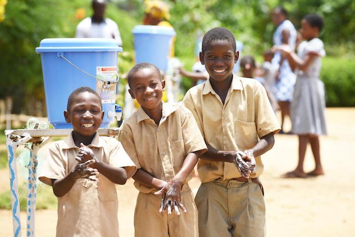 Students wash their hands at school in Essankro, in southeastern Côte d'Ivoire.
