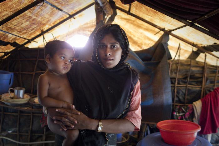 Monsoon rains are flooding homes in the Rohingya refugee camp in Bangladesh, complicating humanitarian relief efforts.