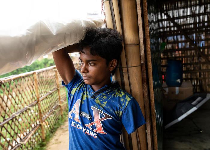 13-year-old Rohingya refugee Mohamed's arm was shot off as he ran away from his village in Myanmar, where houses were being burned down. He now lives in Chakmarkul refugee camp in Bangladesh. 