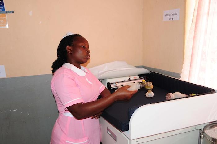 Midwife Betty Ipoot displays a newborn resuscitation kit in Apeitolin Health Center II in Uganda's Napak district.