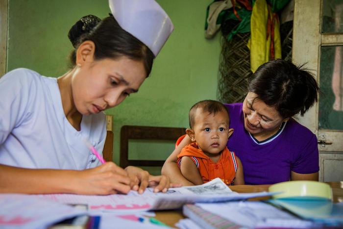 A nurse registers a baby as part of the National Birth Registration Campaign in Naypyitaw, Myanmar on June 4, 2018.