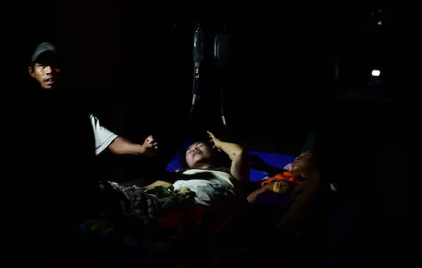On 29 September 2018 in Indonesia, survivors are treated at the Central Sulawesi Regional Police Headquarters Hospital after the earthquake and tsunami that struck Sulawesi on September 28.