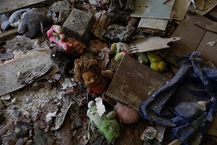 Toys amid the rubble of a damaged school in Novotoshkivske, Luhansk, eastern Ukraine.