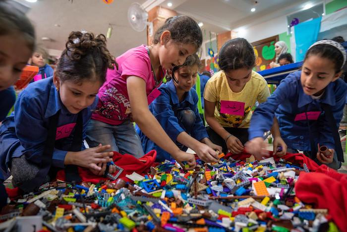Playing with LEGOs is fun and educational for Syrian children living in a refugee camp in Jordan.