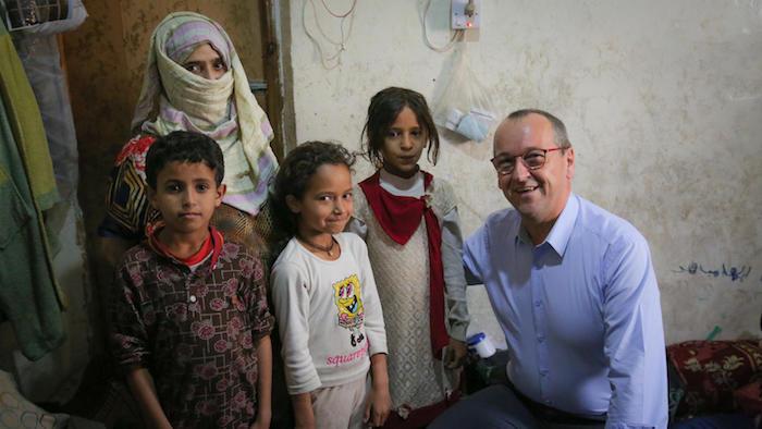 UNICEF Regional Director for Middle East and North Africa Geert Cappalaere visits a family benefiting from the Emergency Cash Transfer program in Sana'a, Yemen in October 2018.