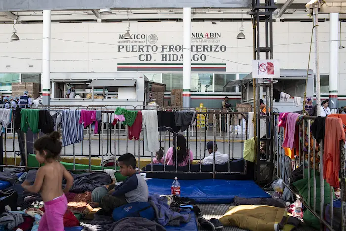 Migrant children and families at the Mexico-Guatemala border in Ciudad Hidalgo, Mexico.